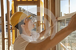 Construction Worker Working On Window