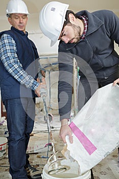 Construction workers on building industry construction site