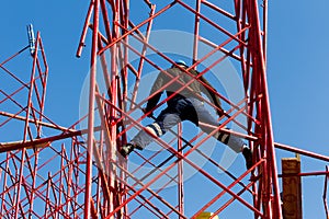 Construction workers building a new structure in city