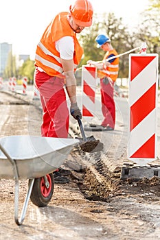 Construction workers on building platform