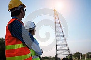 Construction workers control the use of cranes and stake in the construction of buildings and houses