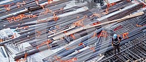 Construction workers fabricating steel reinforcement bar at the construction site