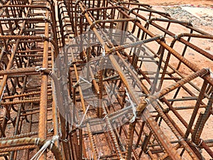 Construction workers fabricating steel reinforcement bar at the construction site.