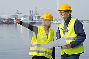 Construction workers in harbor