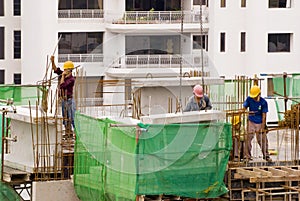 Construction workers at high-r