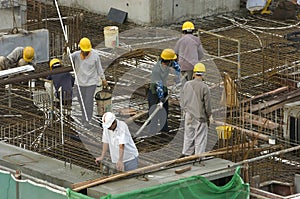 Construction workers at high-rise building