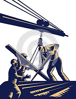 Construction workers hoisting