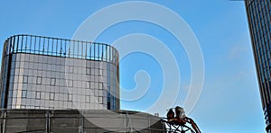 Construction workers in mobile hydraulic construction platform.