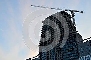Construction workers in mobile hydraulic construction platform.