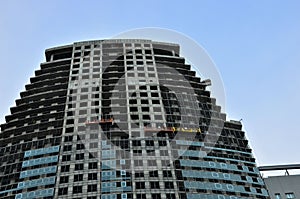Construction workers in mobile hydraulic construction platform.