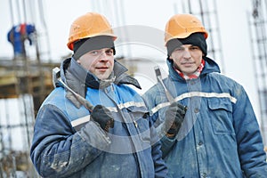 Construction workers preparing formwork