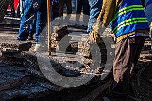 construction workers remove cement from a recreational park that will be redeveloped photo