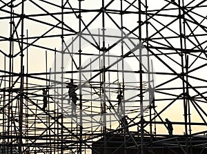 Construction workers on scaffolding