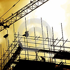 Construction workers on scaffolding