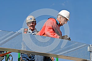 Construction Workers with Sky