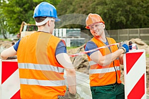 Construction workers talking