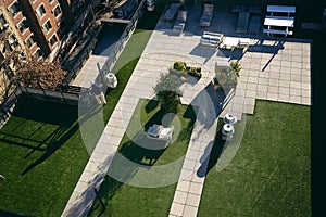 Construction workers work on roof of building