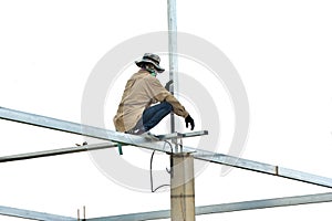 Construction workers working on steel.