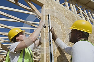 Construction Workers Working Together