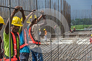 Construction Workers Working Together