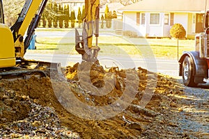 Construction works excavator moving earth