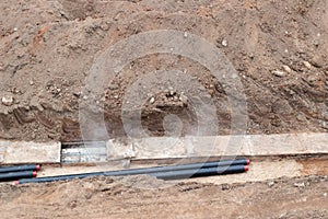 Construction works. Laying a pipeline to provide homes with hot and cold water. Replacing the old pipeline