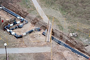 Construction works. Laying a pipeline to provide homes with hot and cold water. Replacing the old pipeline