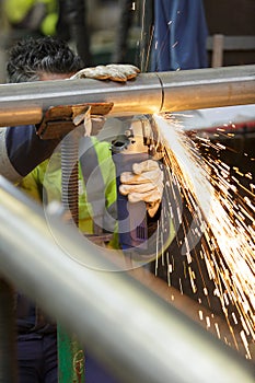 constructions worker welding with sparkles