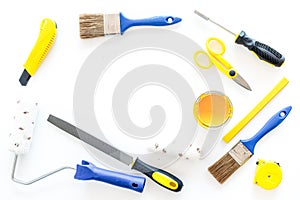 Constructor desk with set of building implements white desk background top view mock up