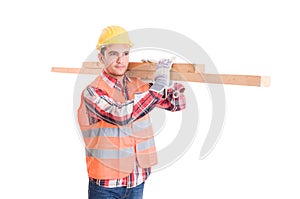 Constructor with yellow helmet carrying woods