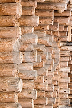 Constuction of wood logs. Wood logs texture background closeup