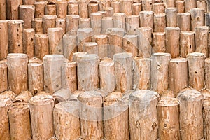 Constuction of wood logs. Wood logs texture background closeup