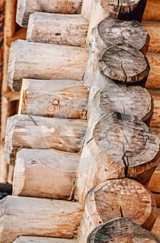 Constuction of wood logs. Wood logs texture background closeup