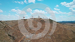 Consuegra town with windmills on hill. Spain