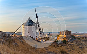 Consuegra windmills and castle long exposure at dusk