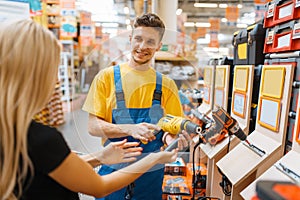 Consultant and female consumer in hardware store