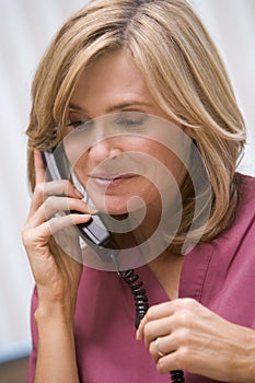 Consultant phoning client with good news