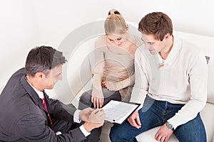 Consultant showing agreement to couple