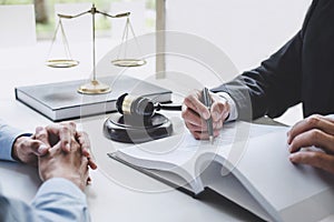 Consultation and conference of Male lawyers and professional businesswoman working and discussion having at law firm in office.