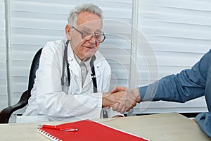 After consultation doctor and patient shake hands