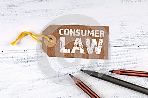 Consumer Law. Rules, regulations and policies concept. Cardboard price tag