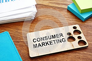 Consumer marketing sign on a plate and business report