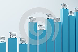 Consumer price index and basket goods concept with front view on metallic shopping trolleys on tops of growing financial chart