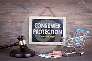 Consumer Rights Protection concept. Chalkboard on a wooden background