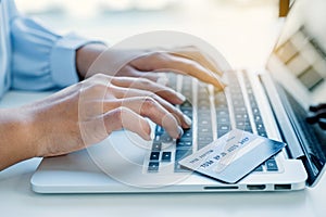 Consumer woman hand use laptop , Ready to a mock up credit card spending pay online finance shopping according to discount