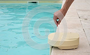 Contact key used to deactivate swimming pool alarm