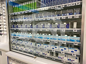 A Contact lens case filled with contacts waiting for customers to purchase at a Sams Club retail store