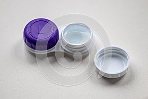 Contact lens container with contact lenses as optic alternative to glasses correct eyesight diseases like farsightedness