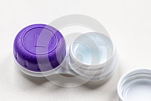 Contact lens container with contact lenses as optic alternative to glasses correct eyesight diseases like farsightedness
