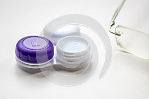 Contact lens container with contact lenses as optic alternative to glasses correct eyesight diseases like farsightedness